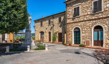 The beautiful village of Suvereto on a sunny summer afternoon. Province of Livorno, Tuscany, Italy. clipart