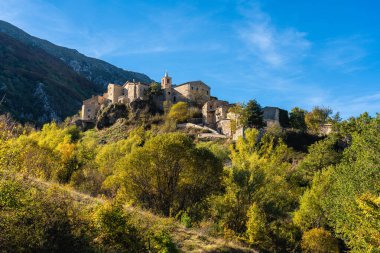 The beautiful mountain village of Roccacaramanico during fall season. Province of Pescara, Abruzzo, Italy. clipart