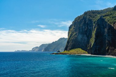 Scenic panoramic view from Miradouro do Guindaste on a summer morning, Madeira island, Portugal. clipart