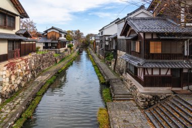 Scenic sight of Hachiman-bori canal in Omihachiman during fall season. Kansai region, Shiga Prefecture, Japan.