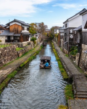 Scenic sight of Hachiman-bori canal in Omihachiman during fall season. Kansai region, Shiga Prefecture, Japan.