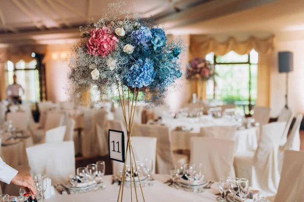 banquet table decorated with flowers