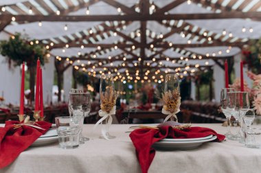 Wedding table decoration. set wooden table at the wedding