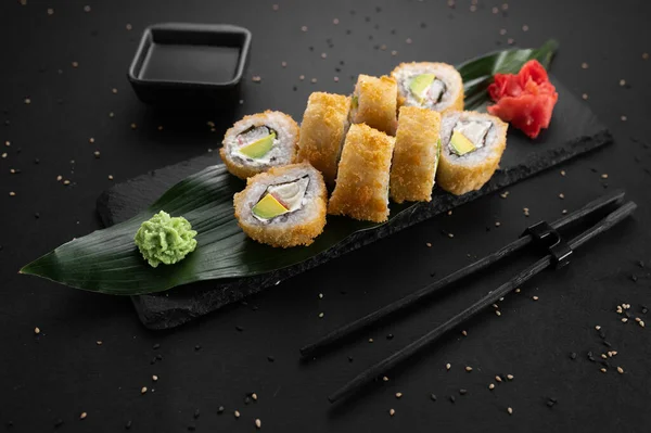 stock image hot rolls with salmon and cream cheese fried in batter.