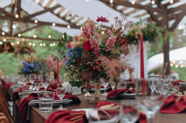 Wedding table decoration. set wooden table at the wedding