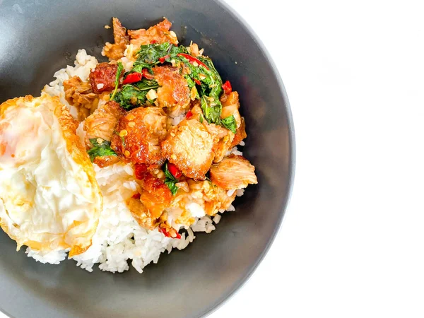 stock image Rice topped with crispy pork belly with Thai basil and fried egg