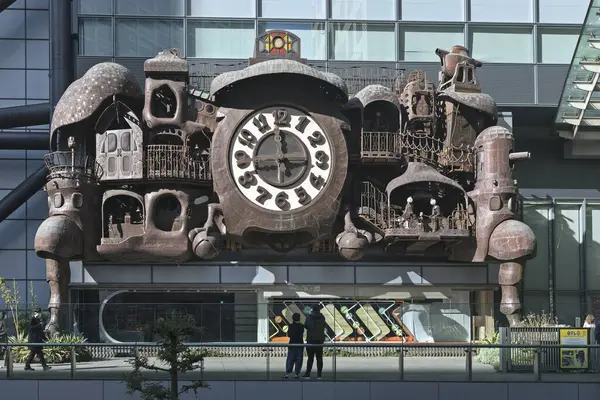 stock image Tokyo, Japan - December 15, 2023: The Giant Studio Ghibli Clock outside of the Nippon TV tower. Steampunk style art object.