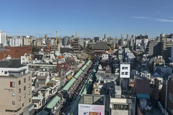 stock image Tokyo, Japan - December 16, 2023: The temple ground of Senso-ji, ancient Buddhist temple located in the Asakusa ward. Nakamise-dori street leads to the temple, lined with shops.