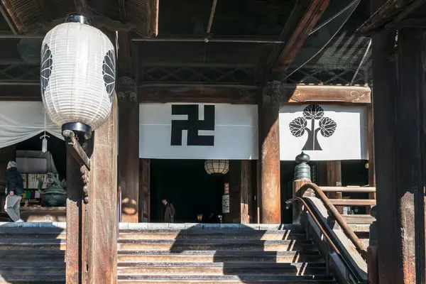 stock image Nagano, Japan - December 24, 2023: Hondo Main Hall of the  Zenkoji Buddhist temple. Swastika sign called manji used as a positive symbol of Buddhism.