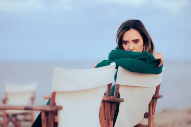 Sad Woman Attending a Beach Wedding Reception 