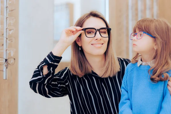 stock image Mother and Daughter Wearing Eyeglasses in an Ophthalmology Clinic 