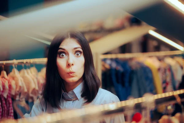 Funny Woman Looking for Clothes in a Fashion Store