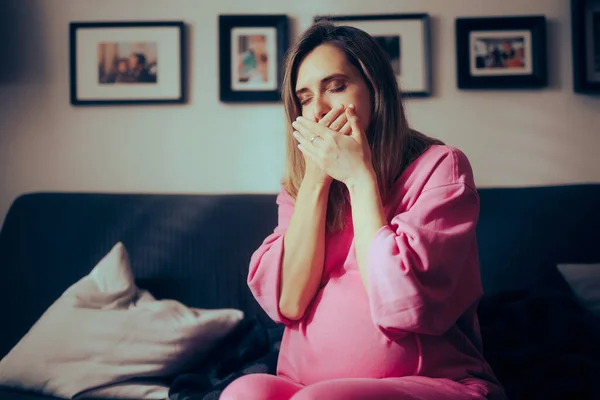 Pregnant Woman in her Third Trimester Feeling Sick at Home