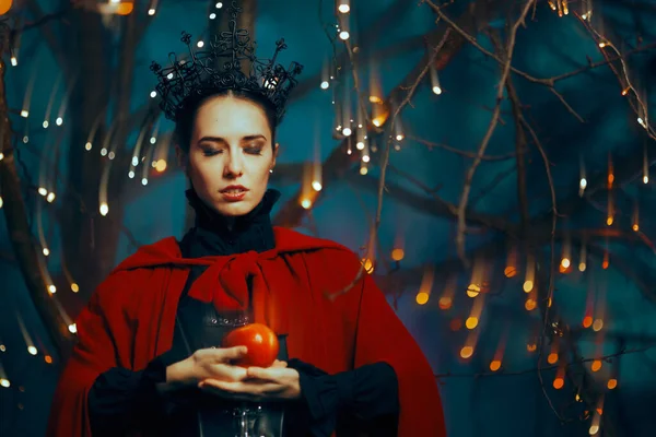 Evil Queen Holding Red Poisonous Apple Bait — Stock Photo, Image