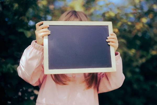 Child Holding Blackboard Announcement Placard — Stok Foto