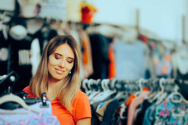 Beautiful Girl Standing in a Clothing Store for Women