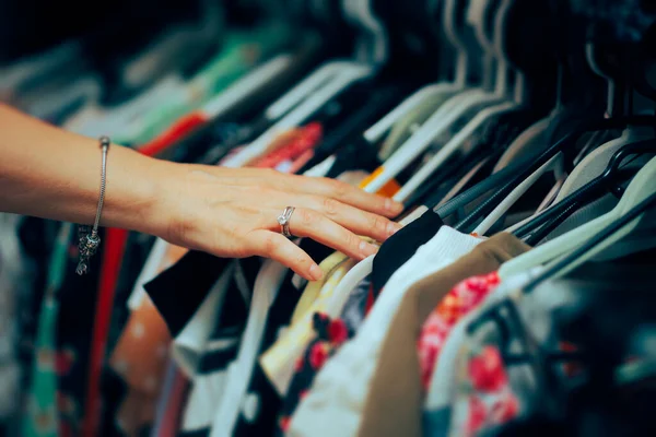 stock image Hand of a Worker Arranging Clothes in a Fashion Store