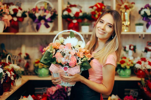 Florist Holding a Beautiful Floral Bouquet in a Flower Shop