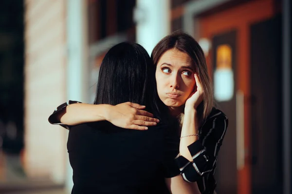 Woman Hugs Fake Friend Making Faces Her Back — Stock Photo, Image