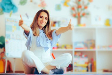 Worker in a Daycare center for Children Holding Thumbs up clipart