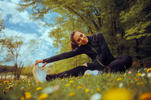 Woman Stretching Her Legs Working Outdoors Meadow — Fotografia de Stock