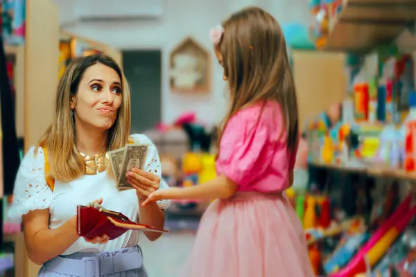 stock image Cheap Mom Giving a Small Allowance to her Daughter 