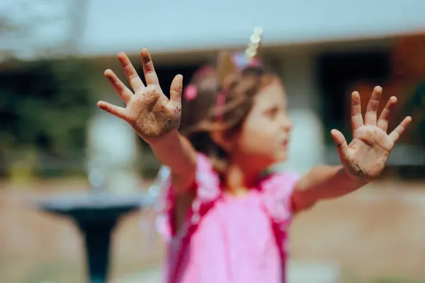 stock image Girl Showing her Dirty Hands Full of Germs After Playtime 