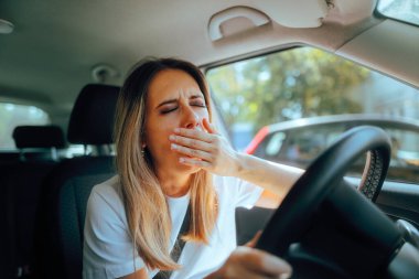 Fatigued Driver Yawning Feeling Sleepy Behind the Wheel  clipart