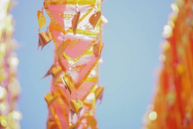 colorful traditional fabric flag decorating hanging in temple