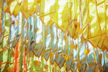 colorful traditional fabric flag decorating hanging in temple