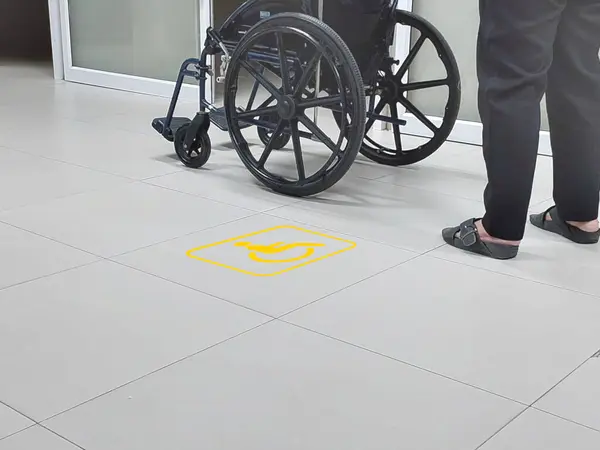 disable people on wheel chair icon on ground marking for patient waiting meet doctor