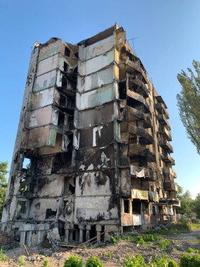 A destroyed multi-storey building from an air bomb explosion. A burned-out residential building due to a rocket explosion. Russia's war with Ukraine, Borodyanka, Kyiv region, July 21, 2022.