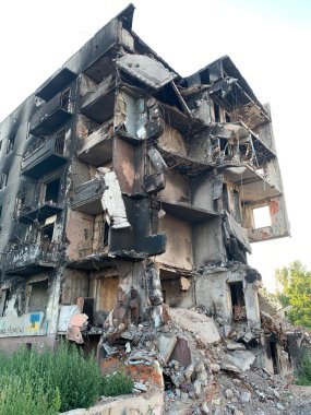 A destroyed multi-storey building from an air bomb explosion. A burned-out residential building due to a rocket explosion. Russia's war with Ukraine, Borodyanka, Kyiv region, July 21, 2022.