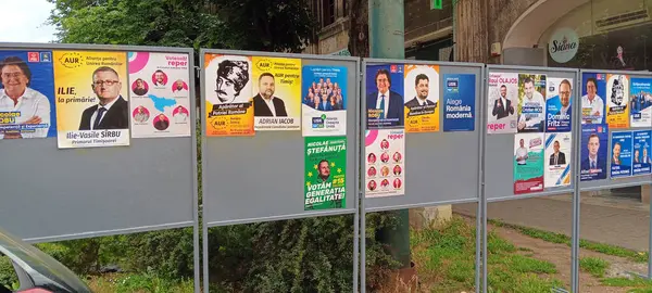 stock image Timisoara / Romania - May 12th, 2024: Official campaign posters for the 2024 romanian local election: Nicolae Robu, Dominic Fritz, Alin Nica, Cristian Mos, Alfred Simonis, Raul Olajos