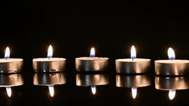 Row Candles Burn Dark Flame Burning Candles Dark Background — Stock Video