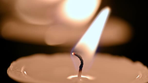 Close Burning Candles Dark Flame Candle Flickers — Stock Video