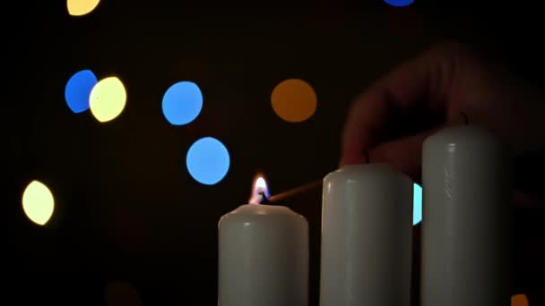 Close Woman Hand Lighting Candle Match Dark Background Blurred Blinking — Stock Video
