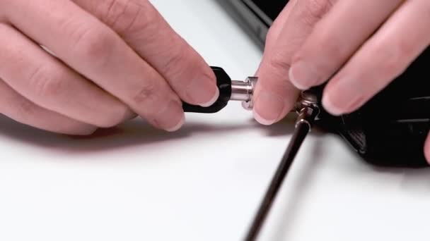 Woman Unlocking Laptop Lock Key Kensington Security Slot Close — Stock Video