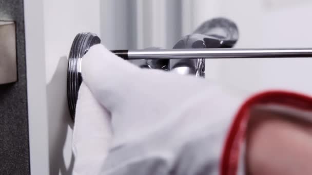 Handyman White Gloves Screwing Doorknob Door Screwdriver — Stock Video