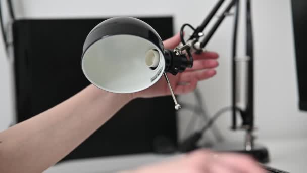 Woman Replaces Light Bulb New Led Lamp Energy Saving Concept — Stock Video