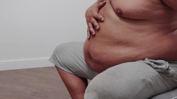 Fat Man Strokes His Big Stomach Man Overweight — Vídeo de Stock