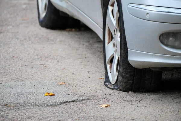Close Flat Front Tire Car Punctured Wheel Residential Street Accident Royalty Free Stock Photos
