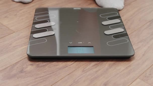 Man Steps Digital Scale Control His Weight While Losing Weight Royalty Free Stock Video