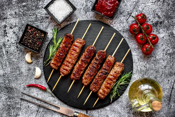 Grilled Sausages Spices Herbs Black Stone Background — Stock Photo, Image