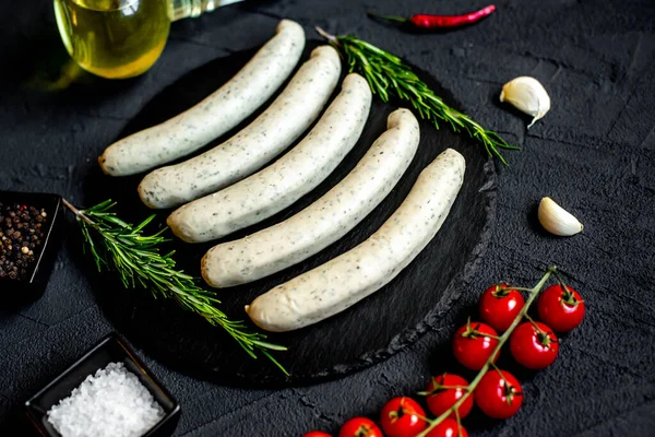 Raw German Sausages Black Stone Background — Stock Photo, Image