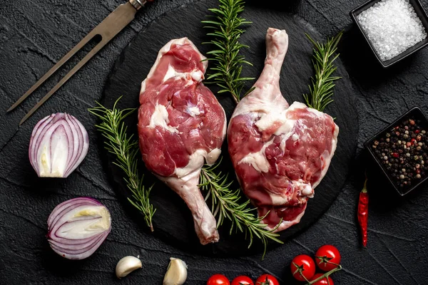 stock image raw lamb legs with spices, close up view, food concept