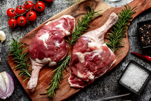 Stock image raw lamb legs with spices, close up view, food concept