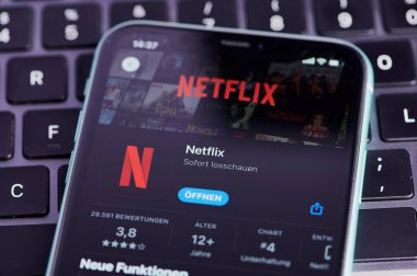 Mainz, Germany - September 25, 2022: icon of the netflix app on a German smartphone in app store