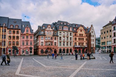 Mainz, Germany - Feb 26, 2023 - People in market square, in the old town of Mainz in the winter season
