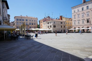 Pula, Istria, Croatia - May 23, 2024: the large square called the Forum of Pula, Istria clipart